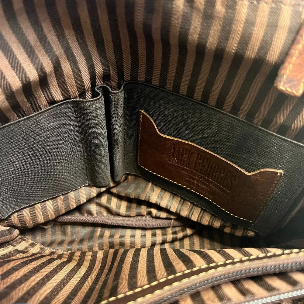 Jack George’s brown leather back pack